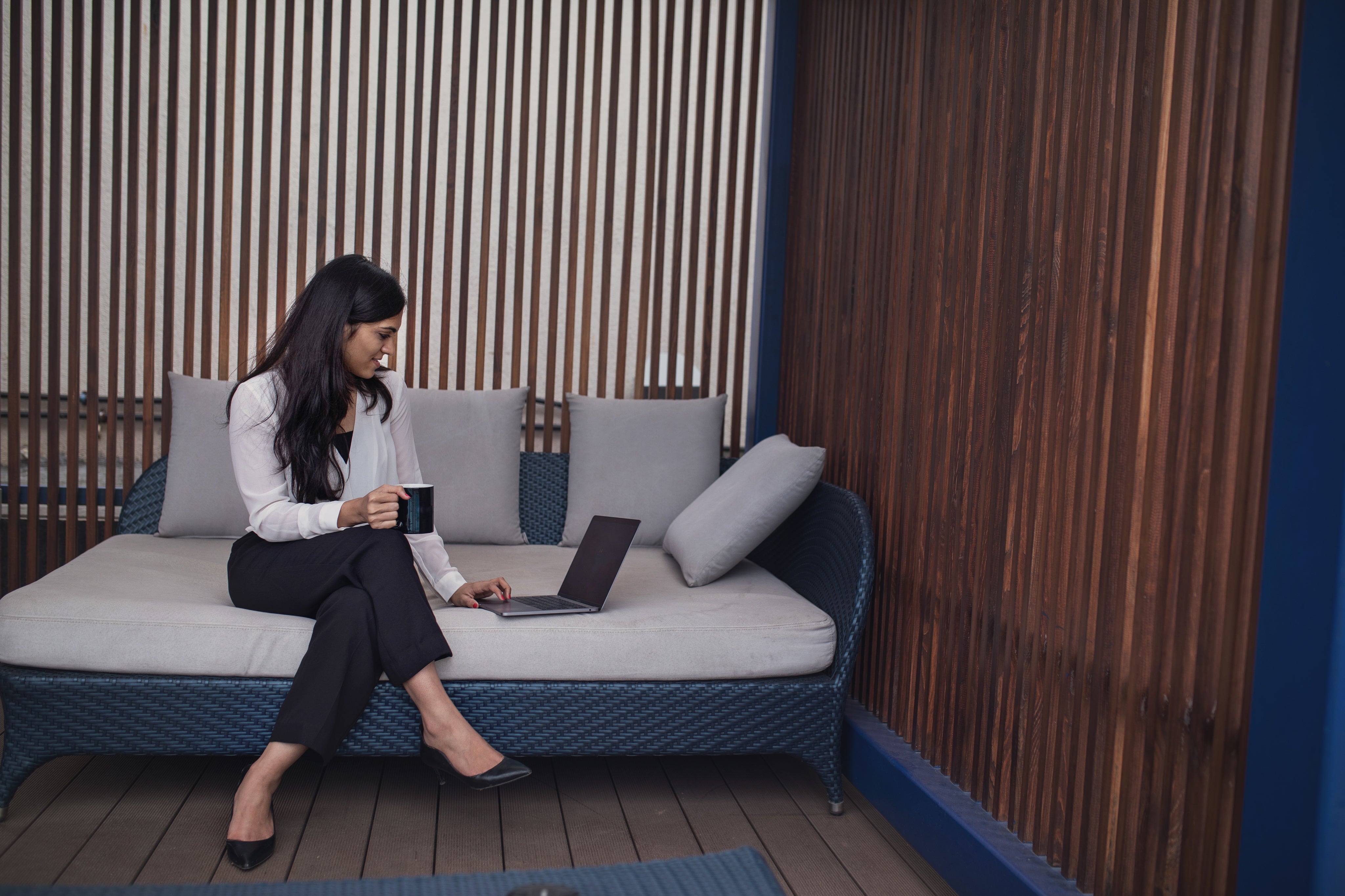 woman-working-on-laptop-on-patio.jpg